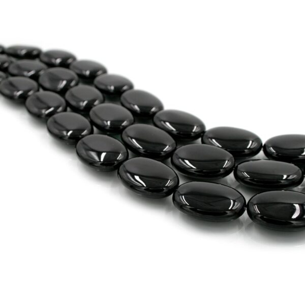 Black agate strands flat oval shape size 25x18mm