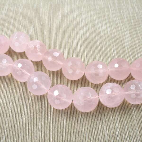 Quarzo rosa fili round sfaccettati 24mm