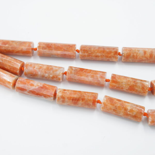 orange calcite fili cilindri sfaccettati 30x12mm
