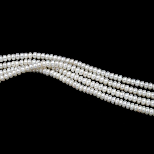 Fresh Water Pearls strands "button" shape size 5½-6mm