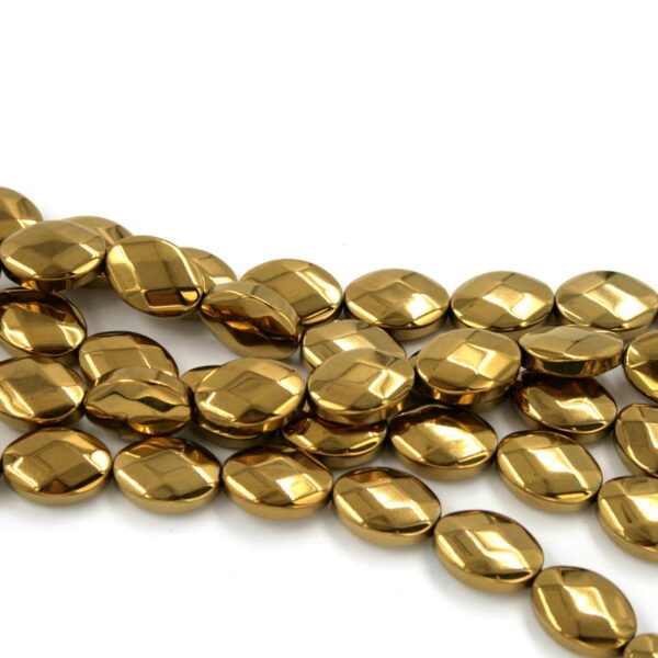 Hematite flat oval facetted shape size 14x10mm gold color