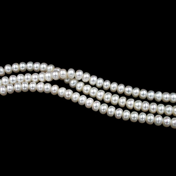 Fresh Water Pearls strands "button" shape size 9-9½mm
