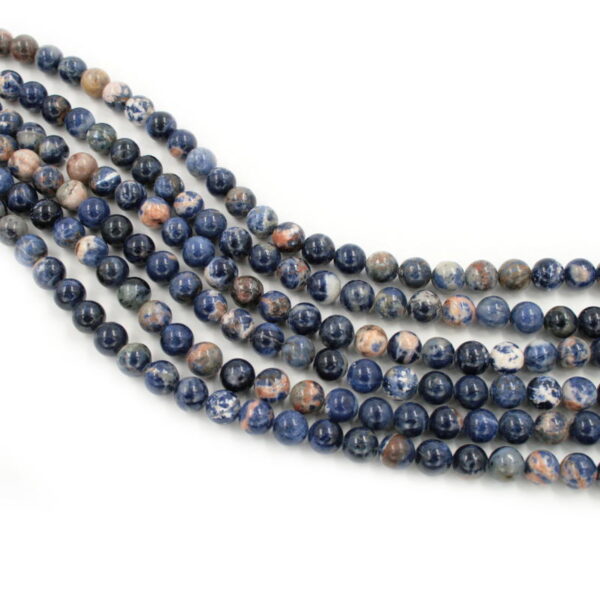 Orange Sodalite strands round beads 6mm to 10mm
