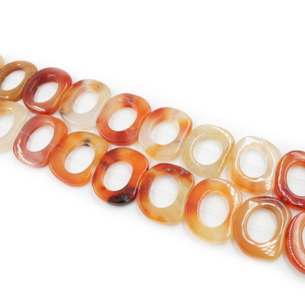 Red Agate strands irregular oval frame shape