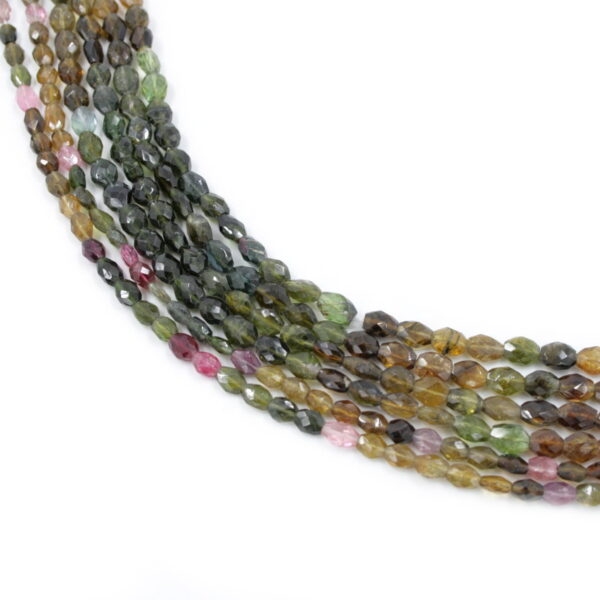 Tourmaline strands faceted lentil shape
