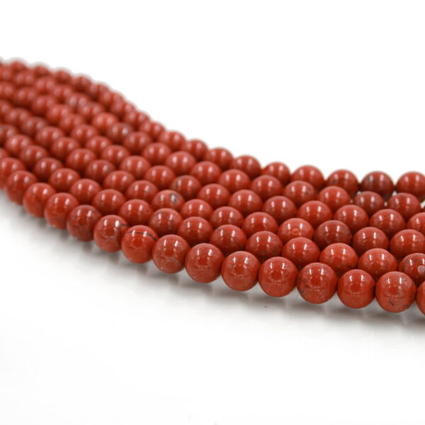 Red Jasper strands round beads 6mm to 10mm