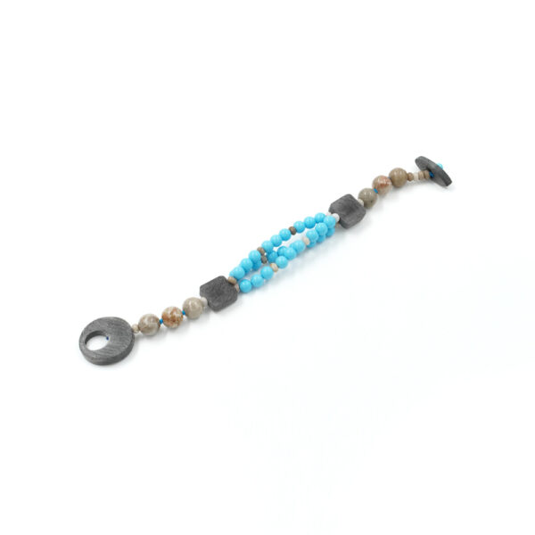 Bracelet with fossil coral, recon turquoise and horn elements and clasp