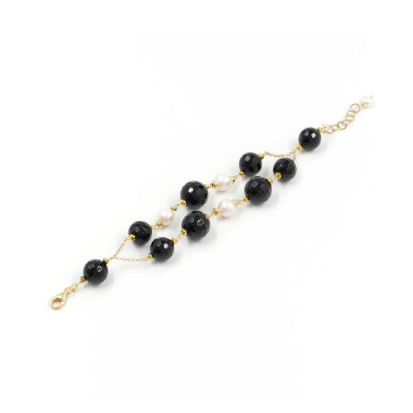 Handmade bracelet with sterling silver strand golden color with black agate, pearls and silver clasp