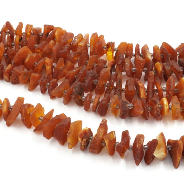 Ambra Baltica fili chips superficie grezza 18x6mm, 20x6mm
