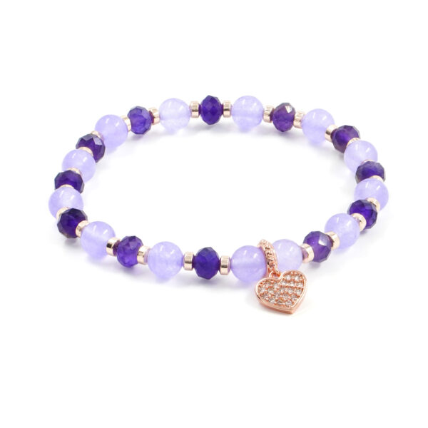 Bracciale Elastico con giada viola tinta, ametista, ematite, elemento in ottone rosato forma cuore con zirconi