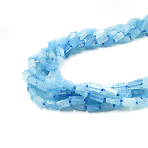 Aquamarina strands faceted cylindrical shape size about 11x7mm