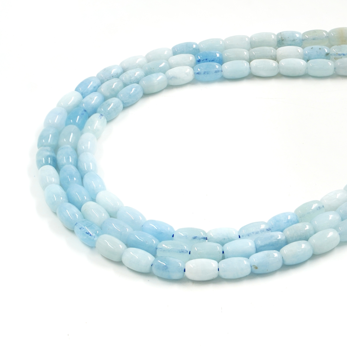 Aquamarina strands cylindrical shape size ~10x6mm