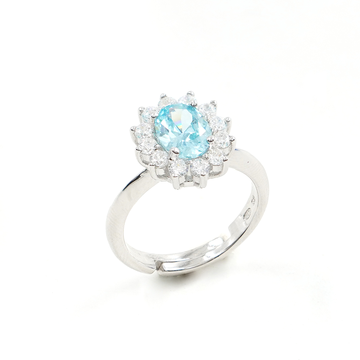 Sterling Silver halo ring with light blue oval zircons and white zircons - Rhodium Color