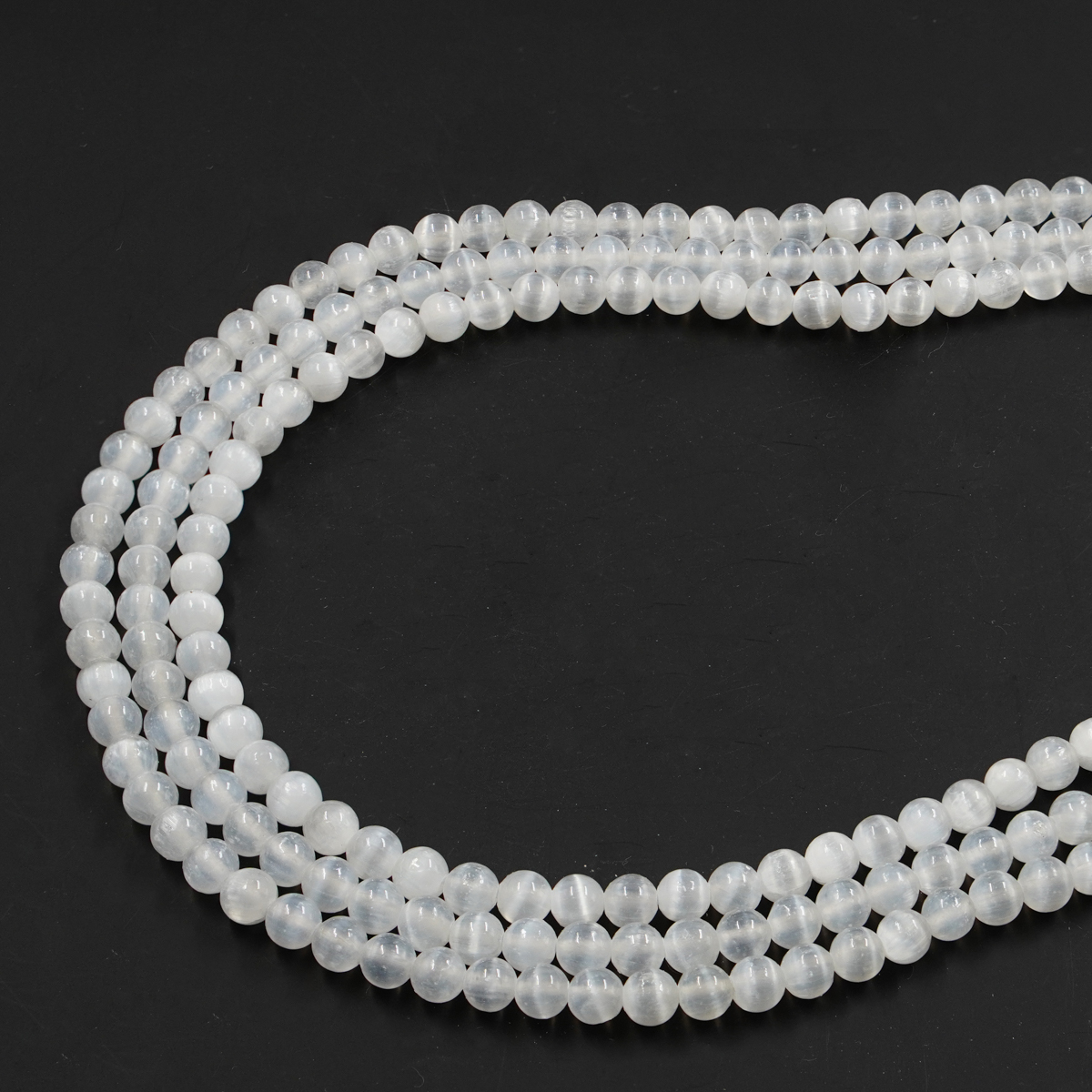 Selenite strands round beads 4mm to 12mm - Image 2