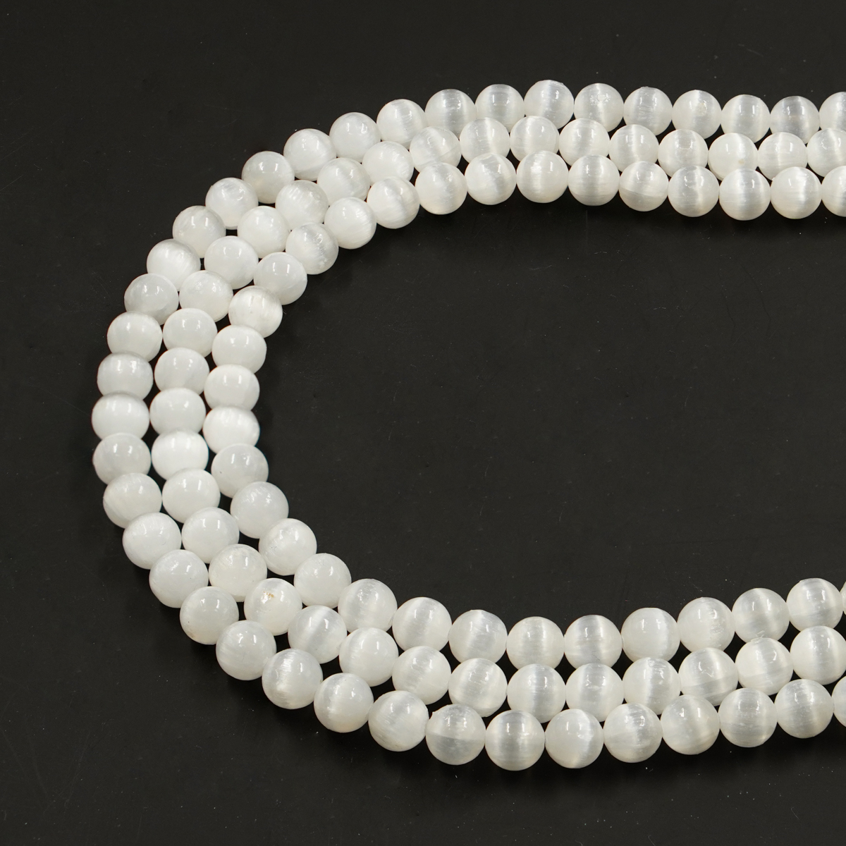 Selenite strands round beads 4mm to 12mm