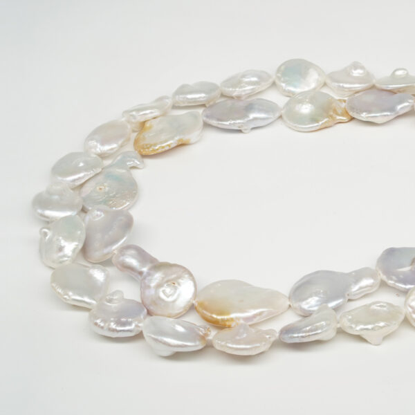 Fresh Water Pearls strands flat free form shape