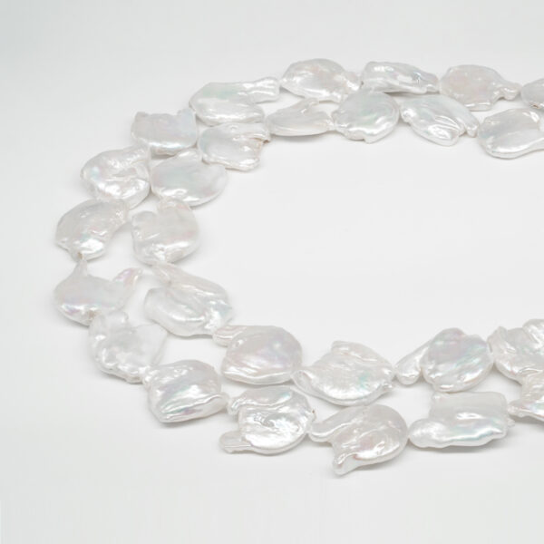 Fresh Water Pearls strands flat free form shape