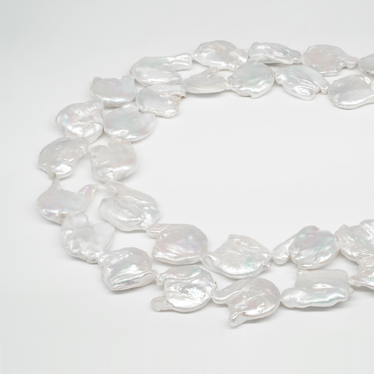 Perle d'Acqua Dolce fili free form piatti