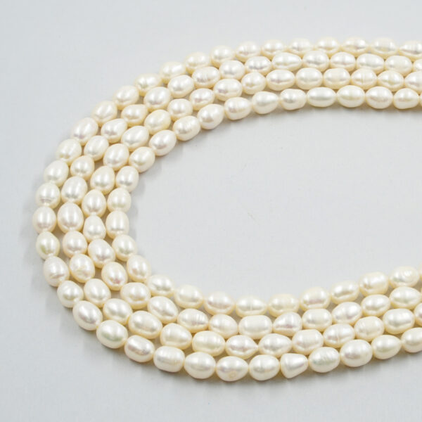 Fresh Water Pearls strands rice shape size 7-8mm