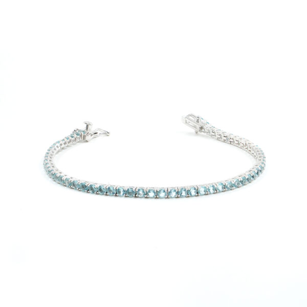 Bracciale Tennis in argento con zirconi azzurri 2,5mm – Rodiato – <em>Lunghezza 18cm</em>