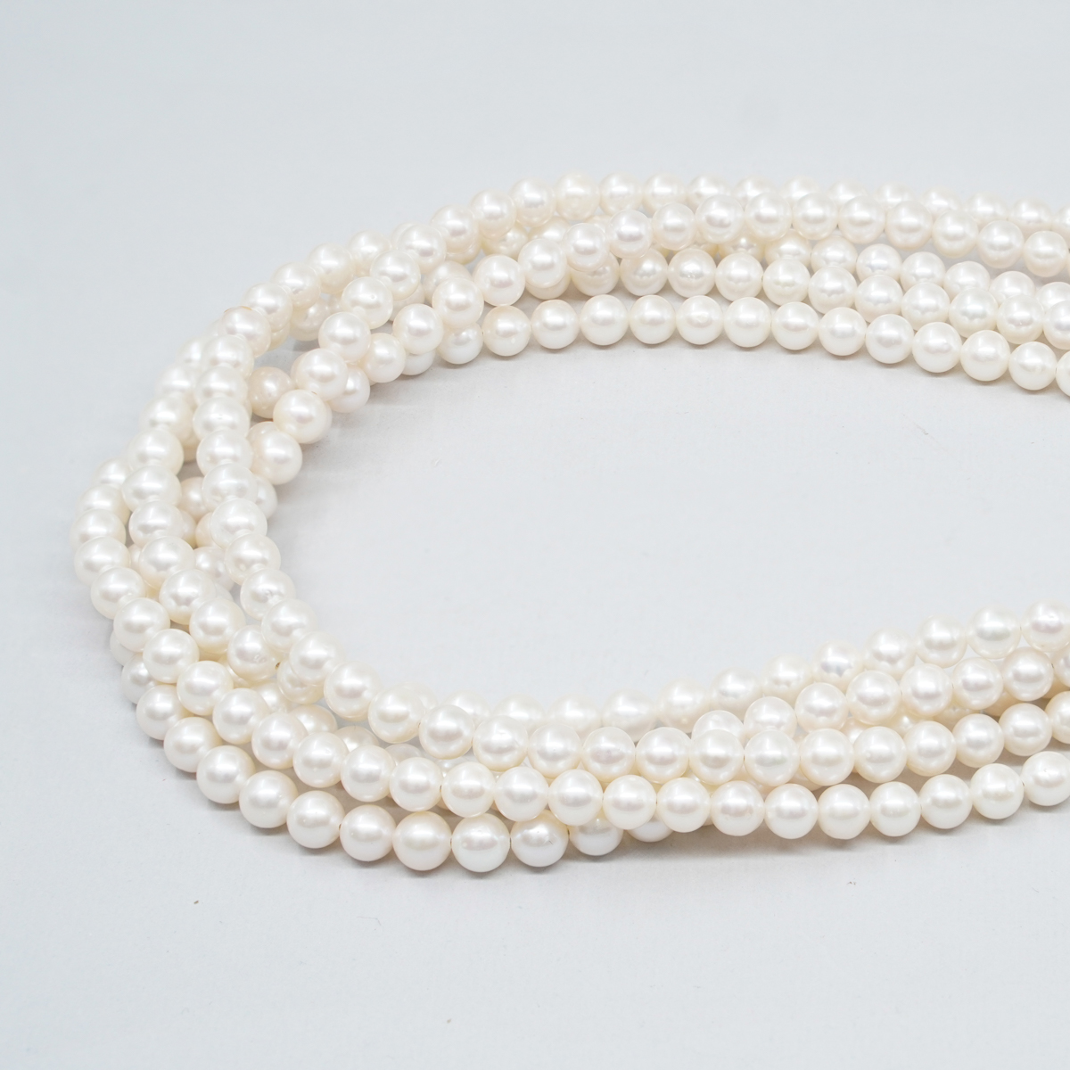 Fresh Water Pearls nucleated strands round shape size 5-5½mm