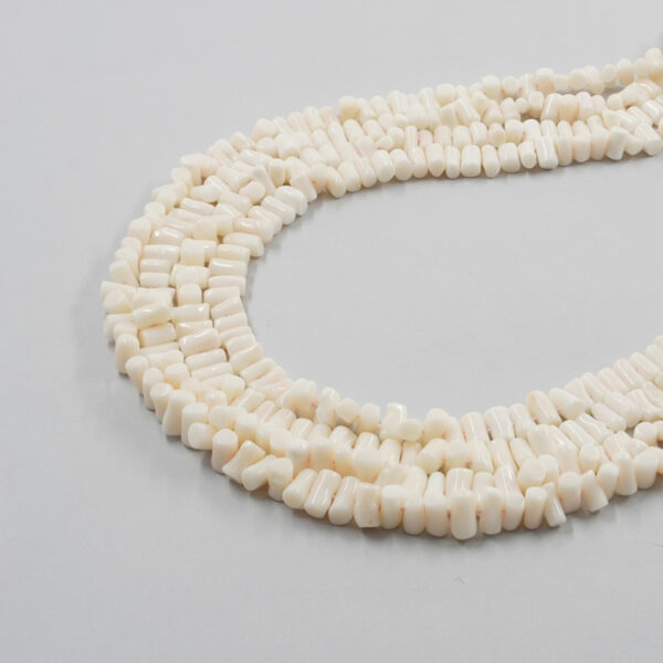White Coral strands cupolini shape ~9x5mm
