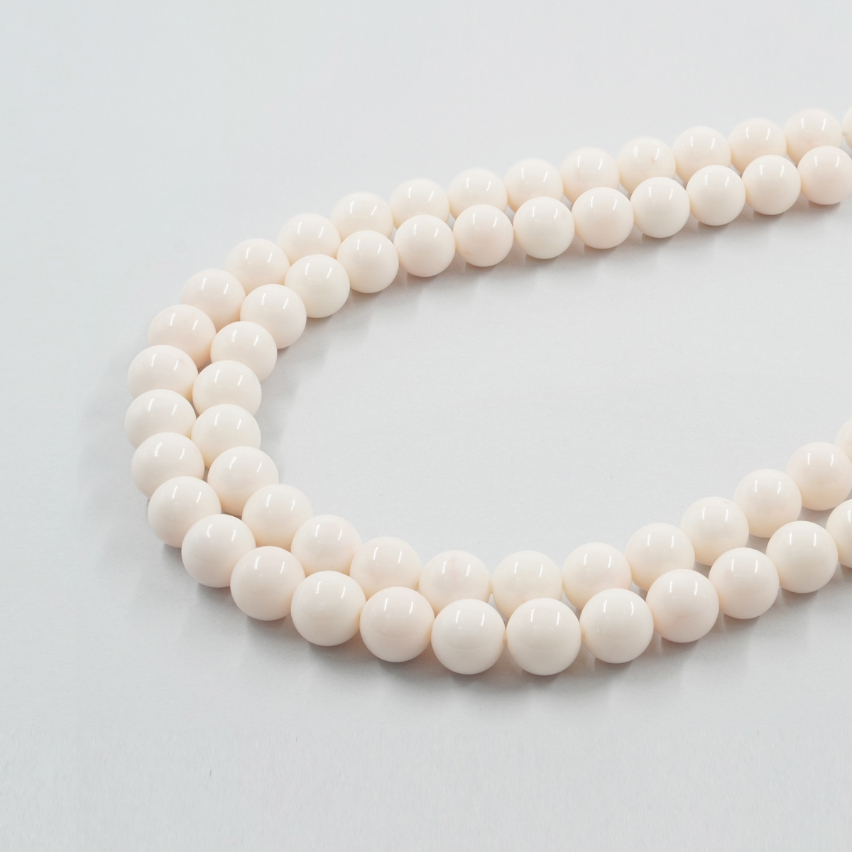 White Coral strands round shape 11mm