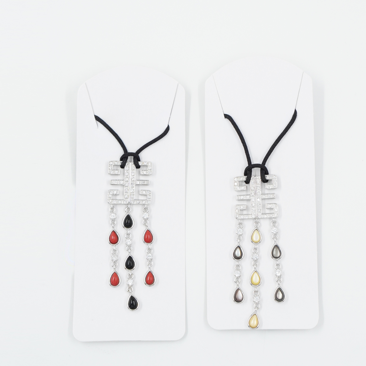 Sterling Silver Pendant with black agate, recon turquoise and red and mother of pearl with lace necklace