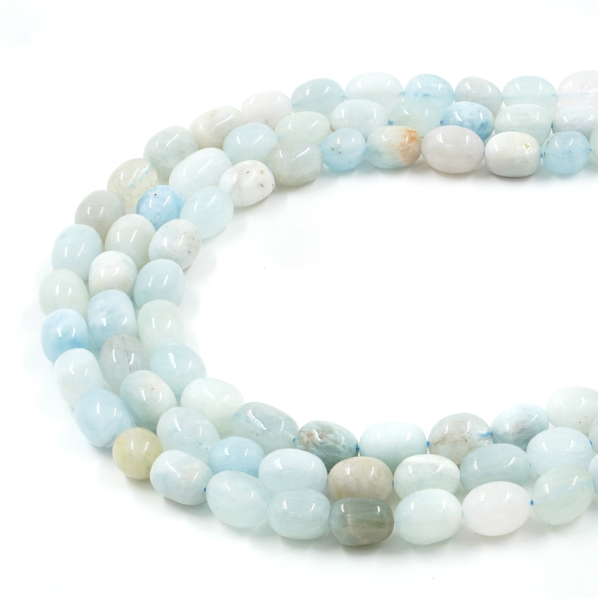 Aquamarine strands tumbles shape size ~12x10mm