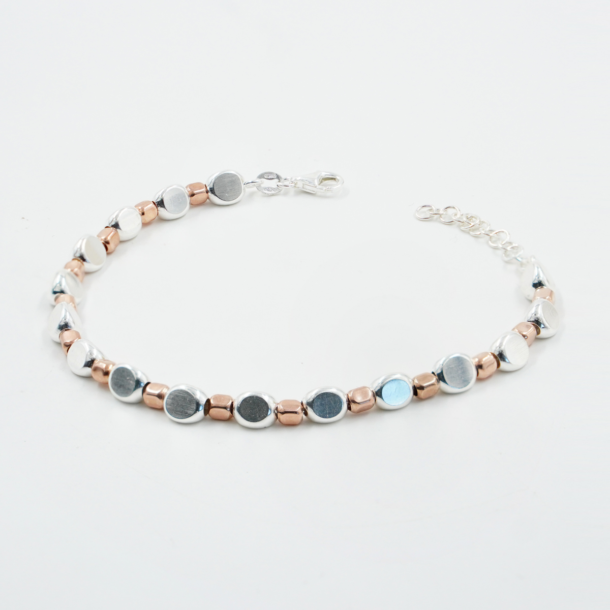 Bracciale in argento con elementi sassi 3mm-4,5mm, Rodiato e Rose’
