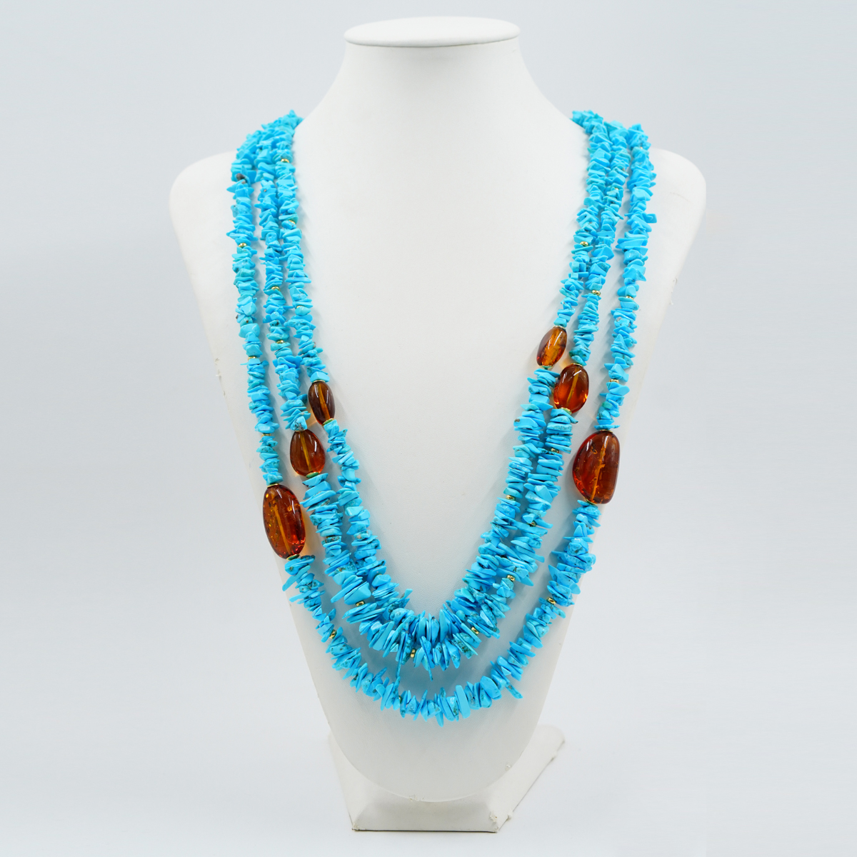 Collana Multifilo con chips di turchese naturale, ambra colombiana cognac, elementi in argento - Dorato