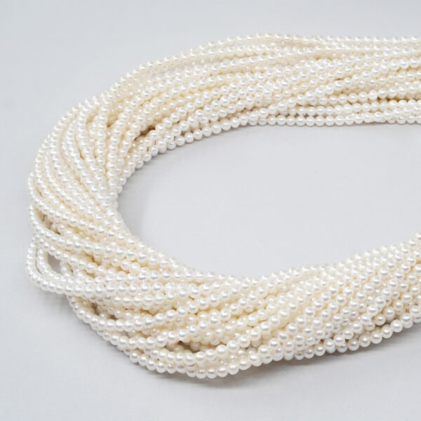 Fresh Water Pearls nucleated strands round shape size 3-3½mm