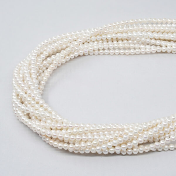 Fresh Water Pearls nucleated strands round shape size 3½-4mm