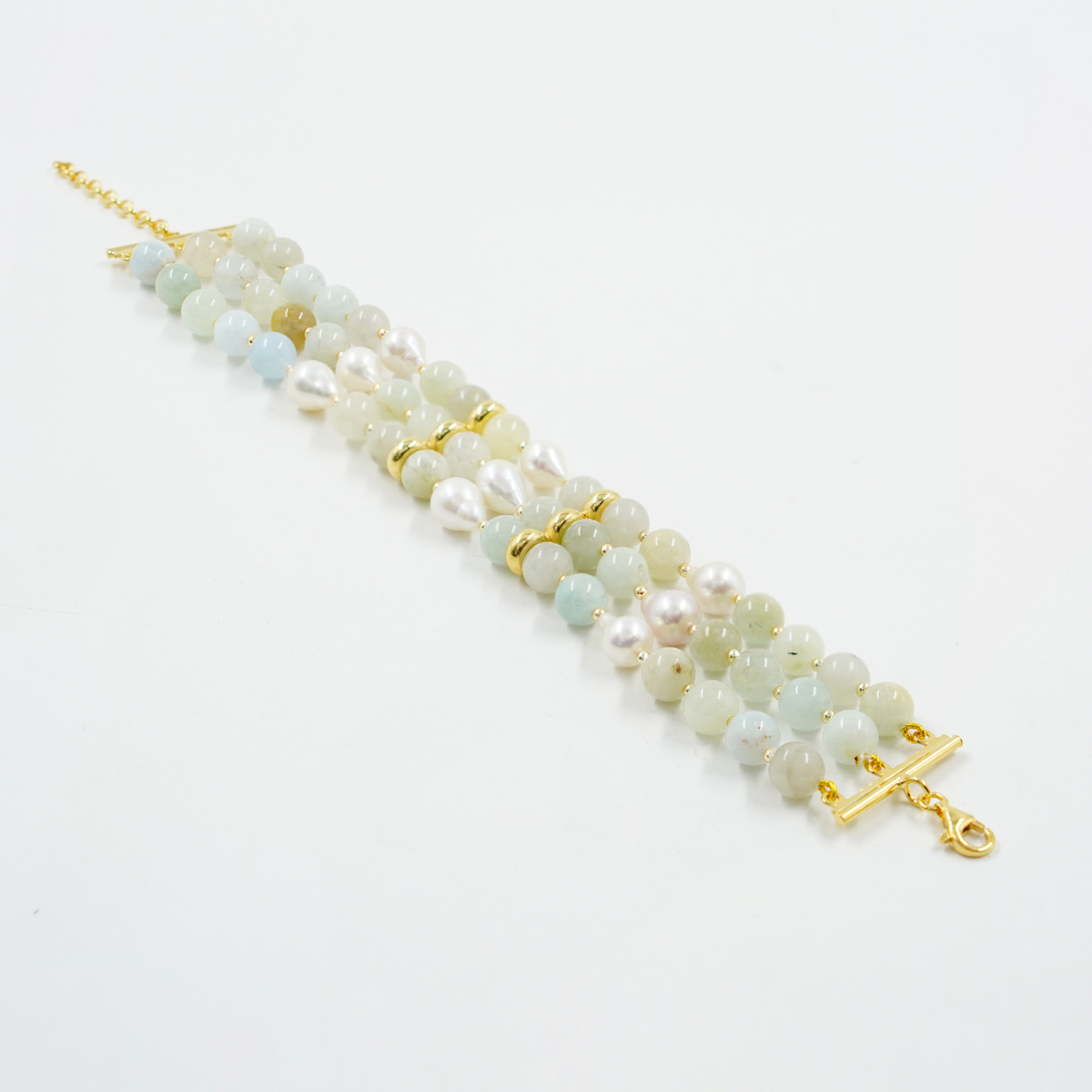 Bracciale in acquamarina, perle, chiusura argento dorato
