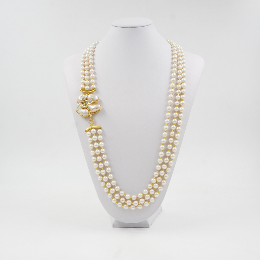 Collana in perle, chiusura in argento dorato
