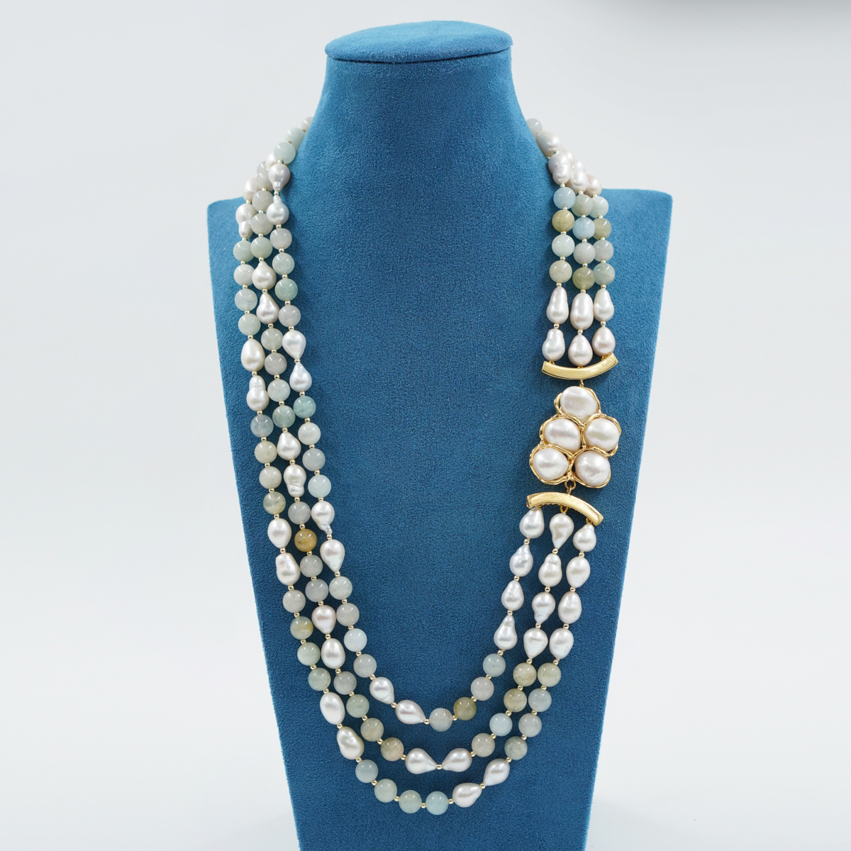 Collana in acquamarina, perla, chiusura argento dorato
