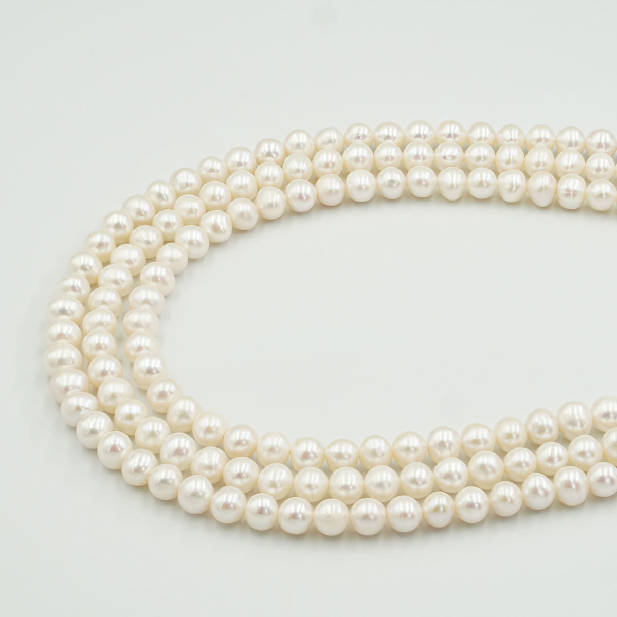 Perle Acqua Dolce fili tondi 5-5,5mm