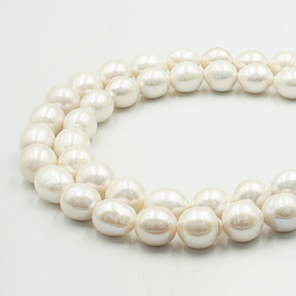 Perle Edison fili ovali 13-15mm